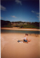 03_40_maisie_sitting_on_cylinder_beach